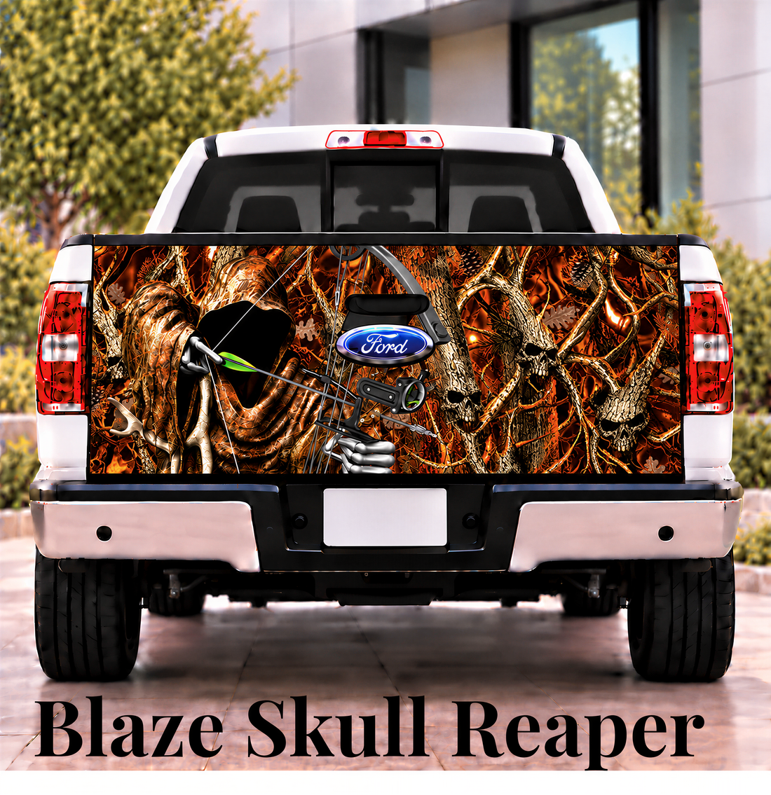 a white Ford truck with a large, detailed graphic of a skull and crossbones design on the rear bumper.