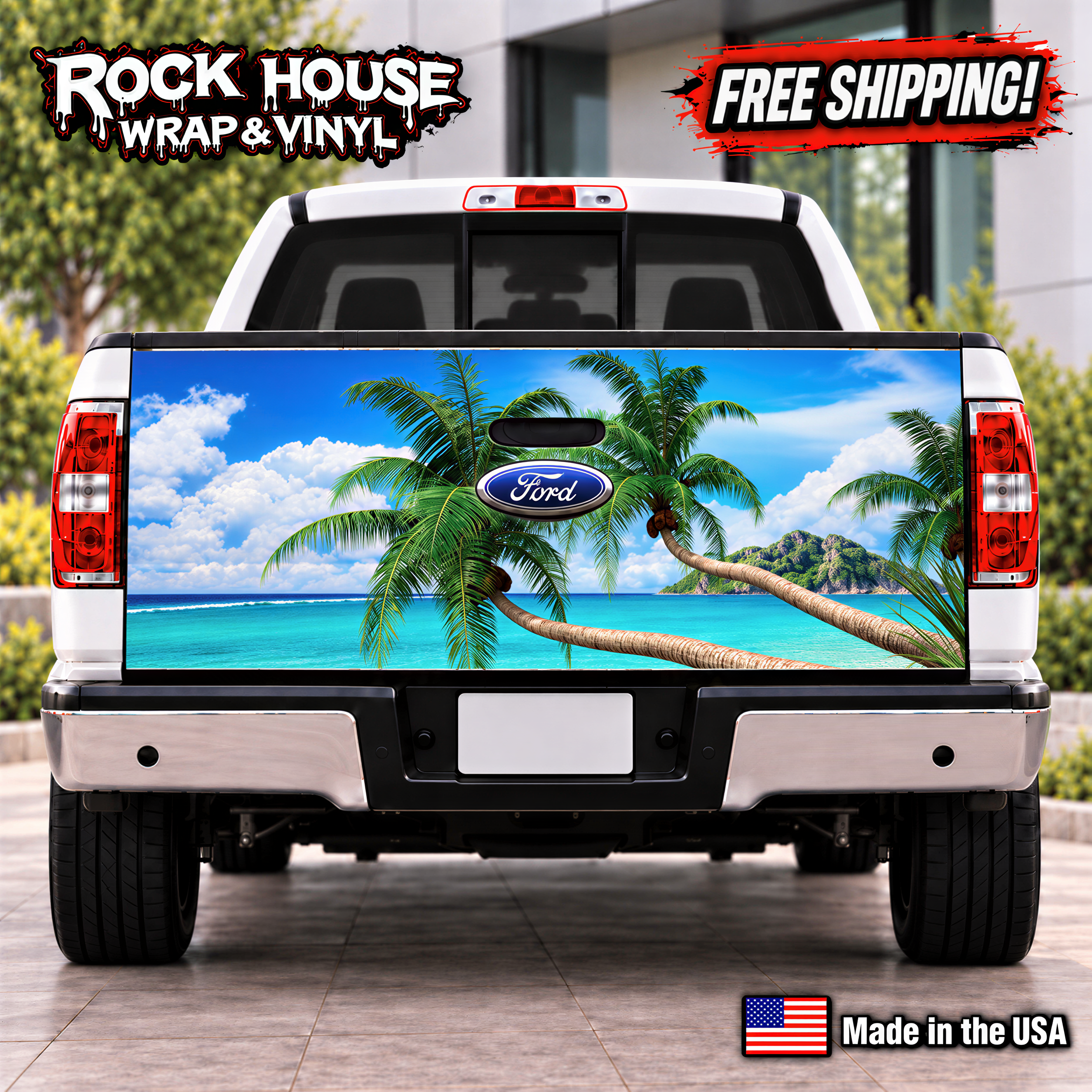 the rear of a white Ford truck with a tropical beach scene decal on the tailgate.